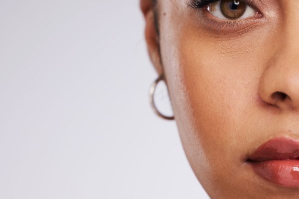portrait of a woman in a studio with a skincare, natural and facial routine